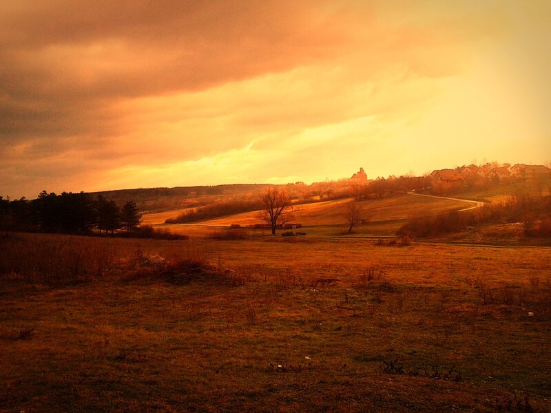 Village on a Hill — Orange, Dramatic, Sunset, Photograph