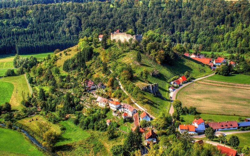 Village on a Hillside — Green, Serene, Afternoon, Photograph, Castle