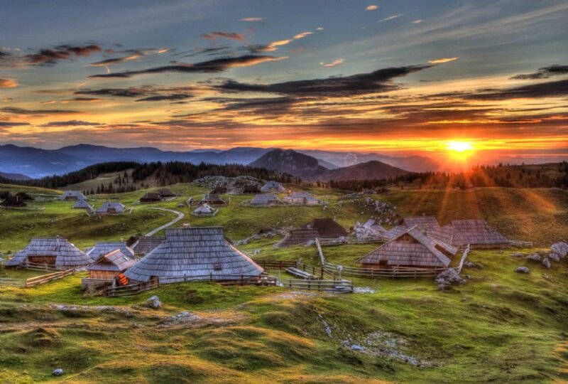Village on a Hillside — Green, Serene, Sunset