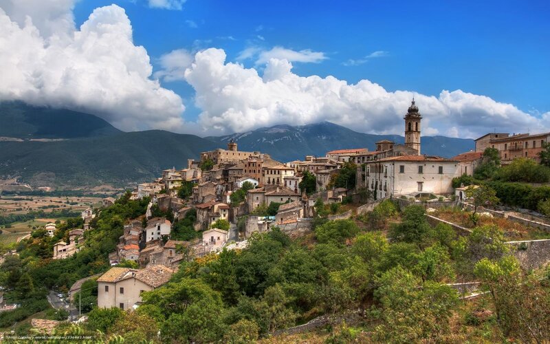 village on a hillside in italy