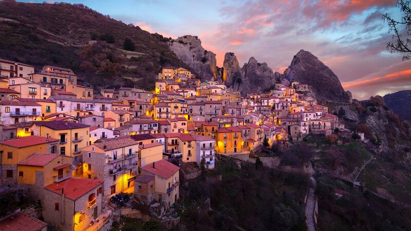 Village on a Hillside — Orange, Dramatic