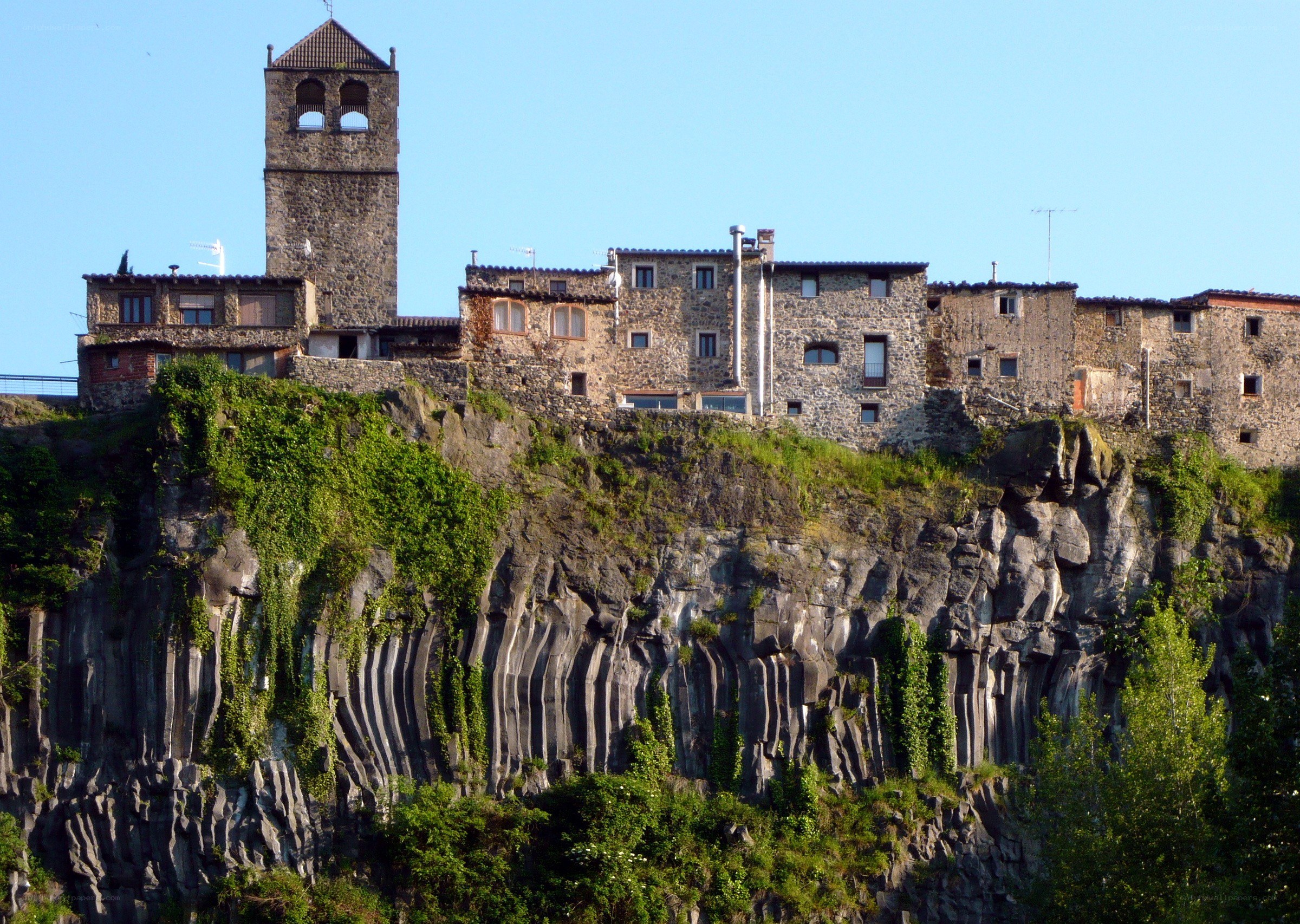 village on a volcanic cliff