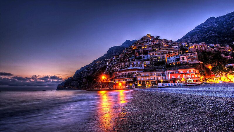 Village on Coastal Cliff — Blue, Dramatic, Night, Photograph, Beach