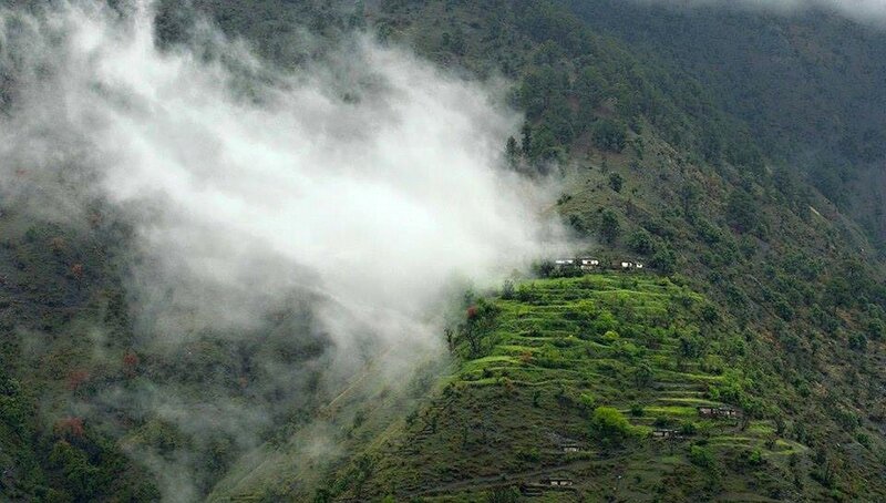 Village on Misty Hillside