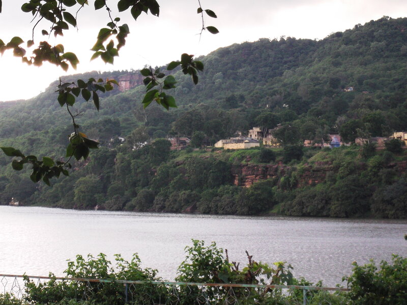 Village on Riverbank — Green, Calm