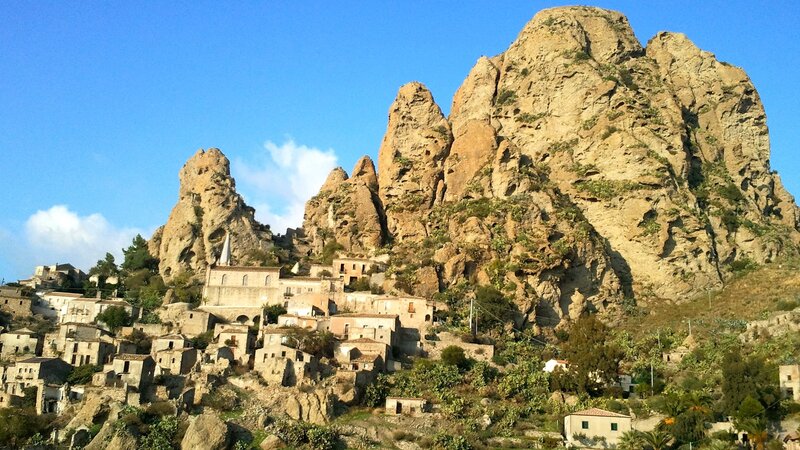 Village on Rocky Hillside — Blue, Serene
