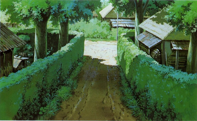 village path through green hedges