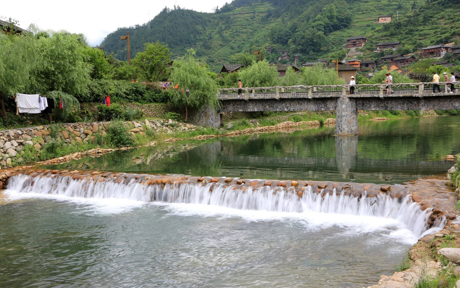 village river with stone bridge