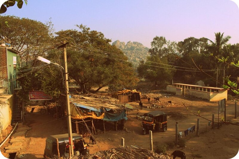 Village scene with rocky hills