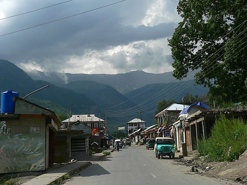 village street with mountains