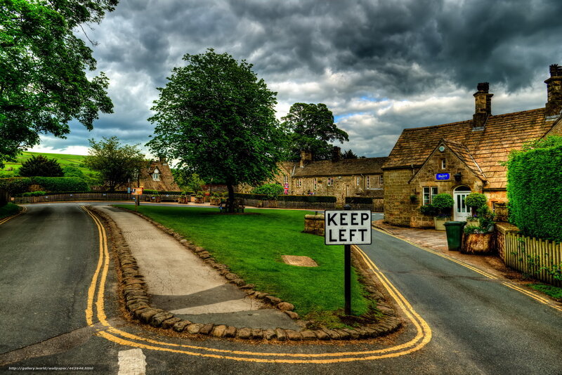 Village street with stormy sky