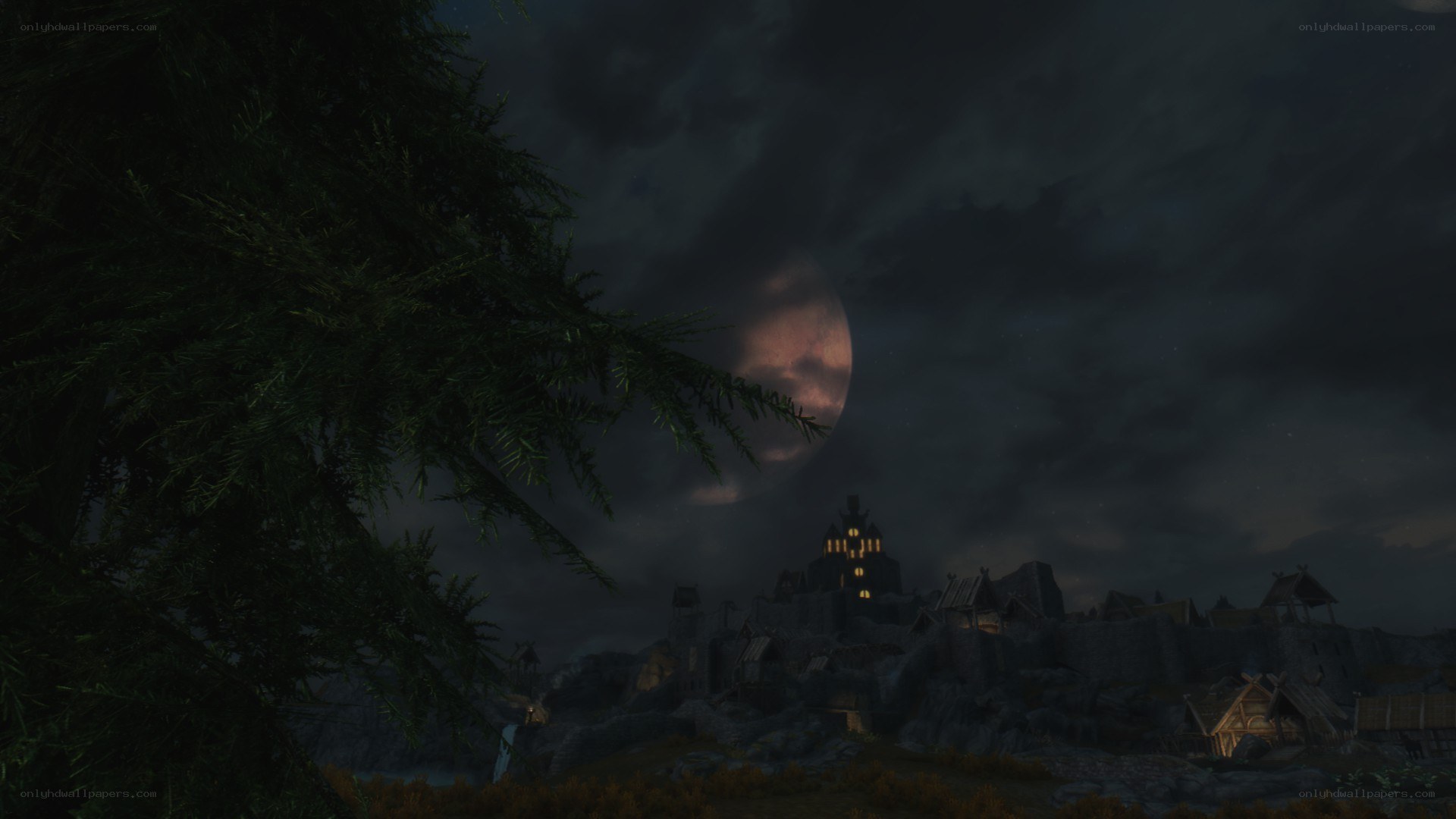 village under a full moon