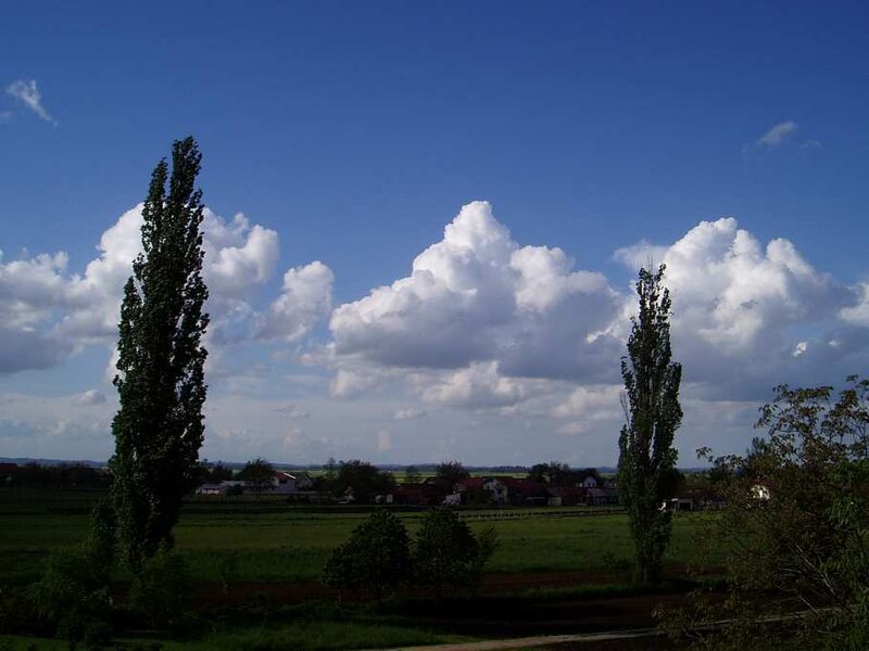 Village under Cloudy Sky — Blue