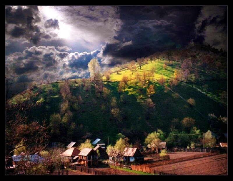 Village under stormy sky