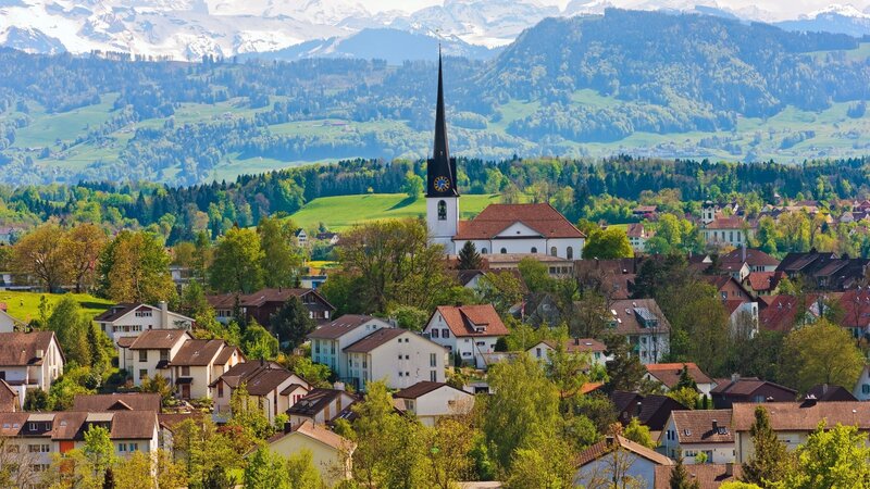 Village with church and mountains