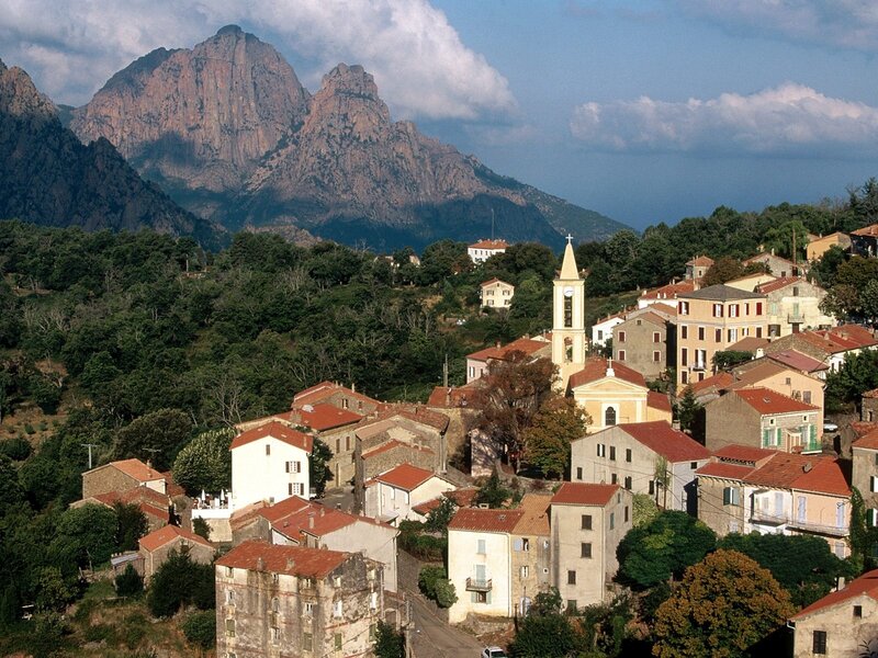 village with mountain backdrop