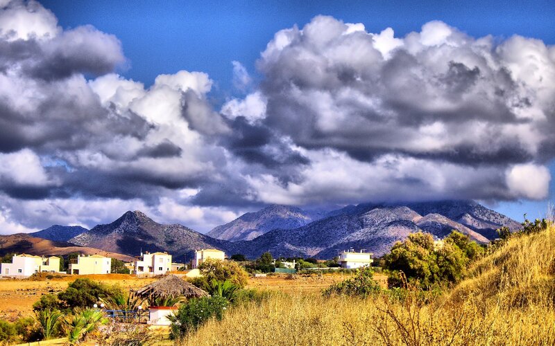 Village with Mountains — Blue, Dramatic, Afternoon, Photograph, Clouds
