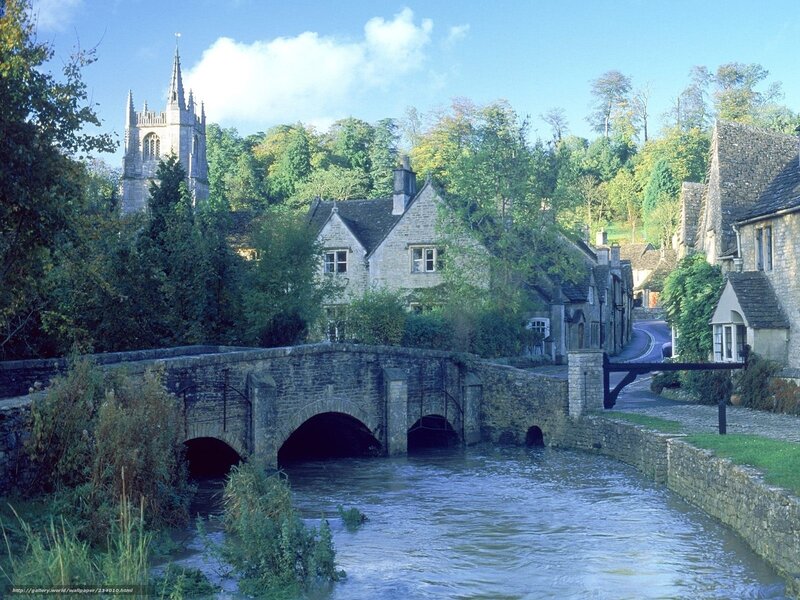 village with stone bridge and church