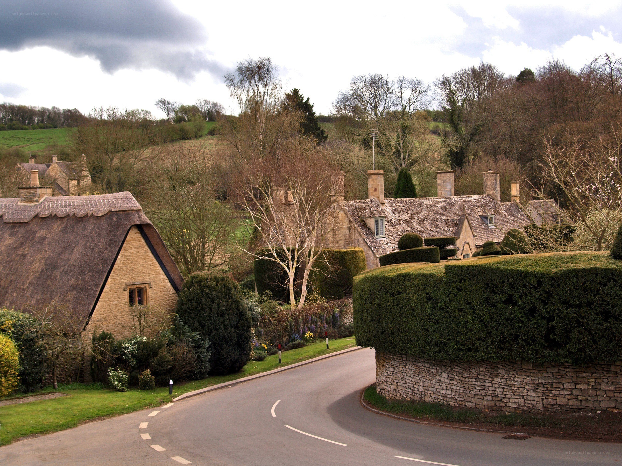 village with thatched cottages