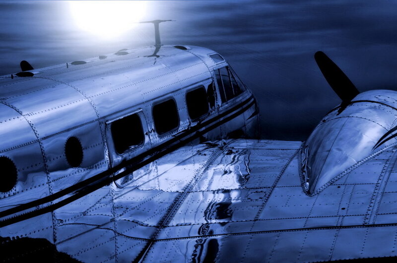 Vintage airplane in blue light