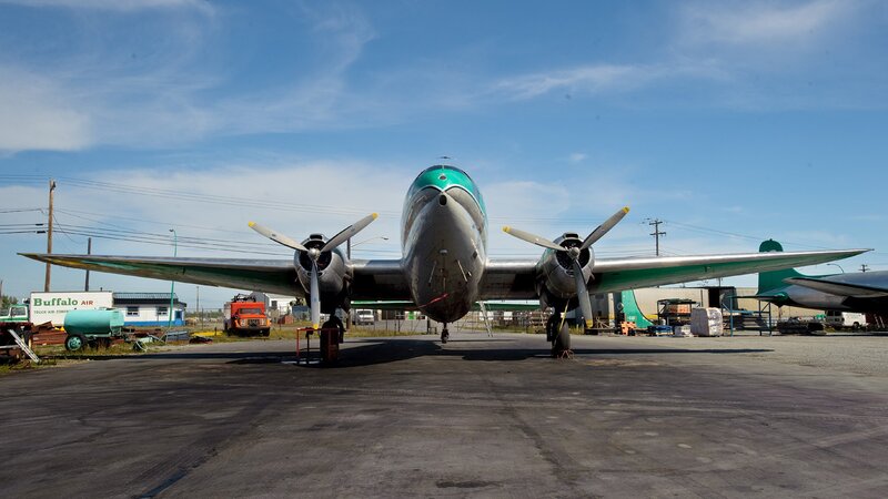 Vintage airplane on tarmac