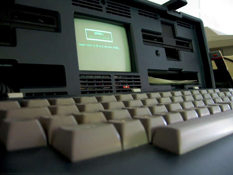Vintage Apple computer with keyboard
