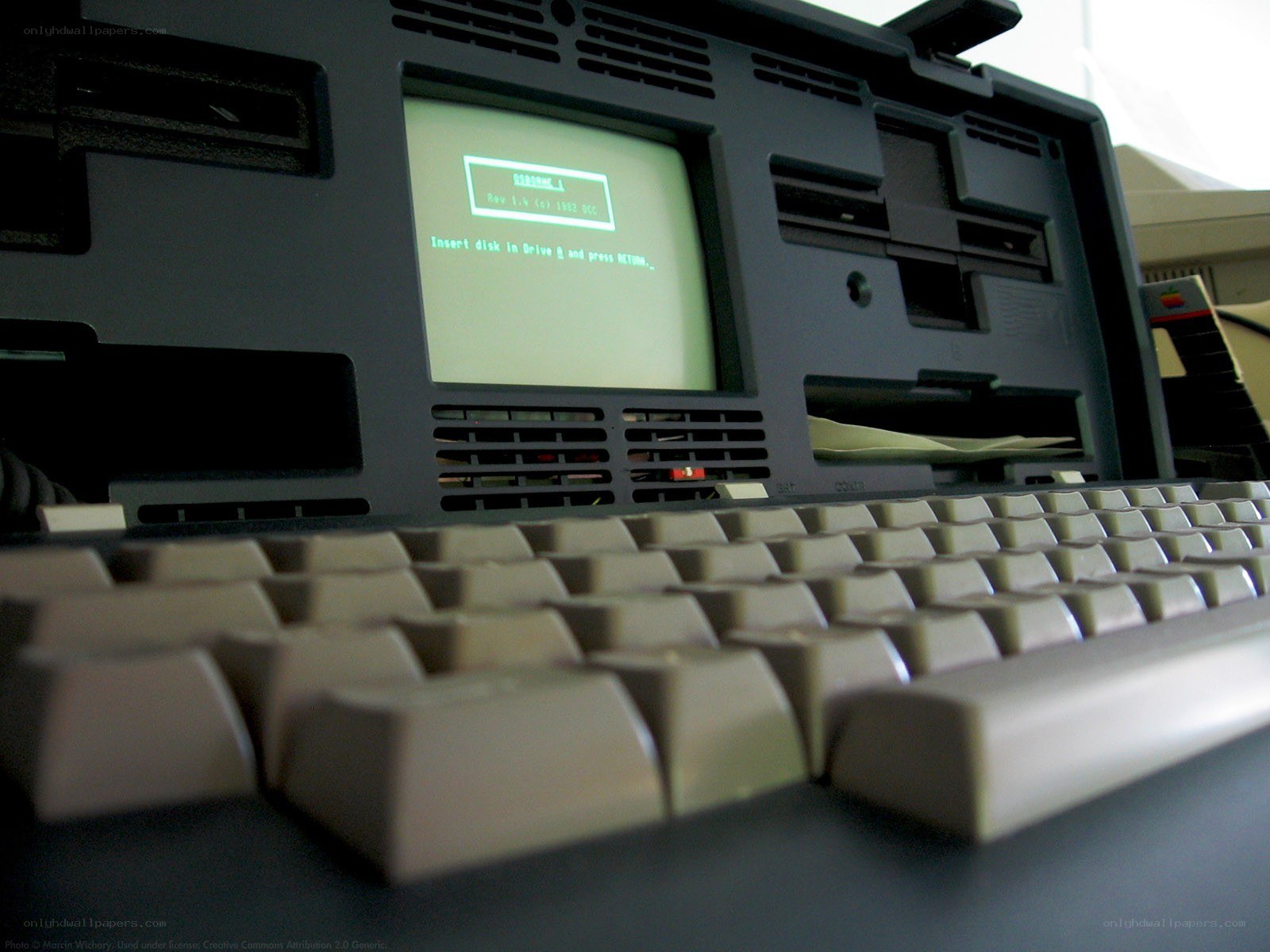 Vintage Apple computer with keyboard