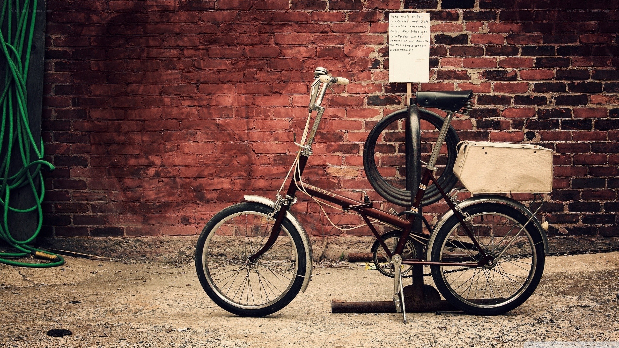 Vintage bicycle against brick wall