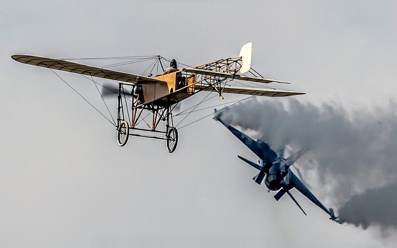 Vintage Biplane and Jet