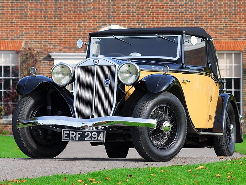 vintage black and yellow car