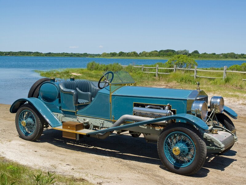 Vintage blue car by the water