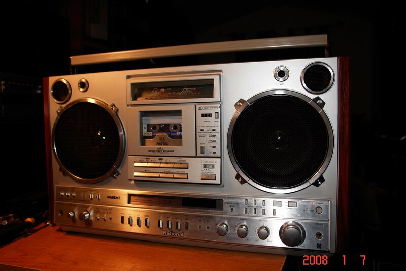 Vintage boombox on wooden table