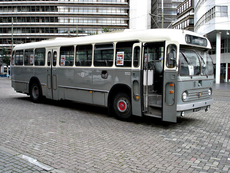 Vintage bus in city square