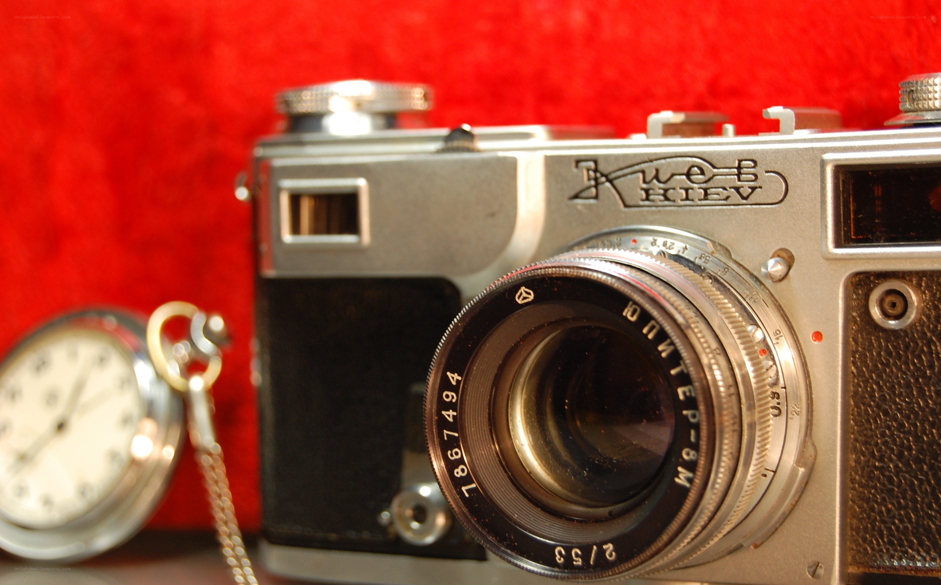 vintage camera and pocket watch