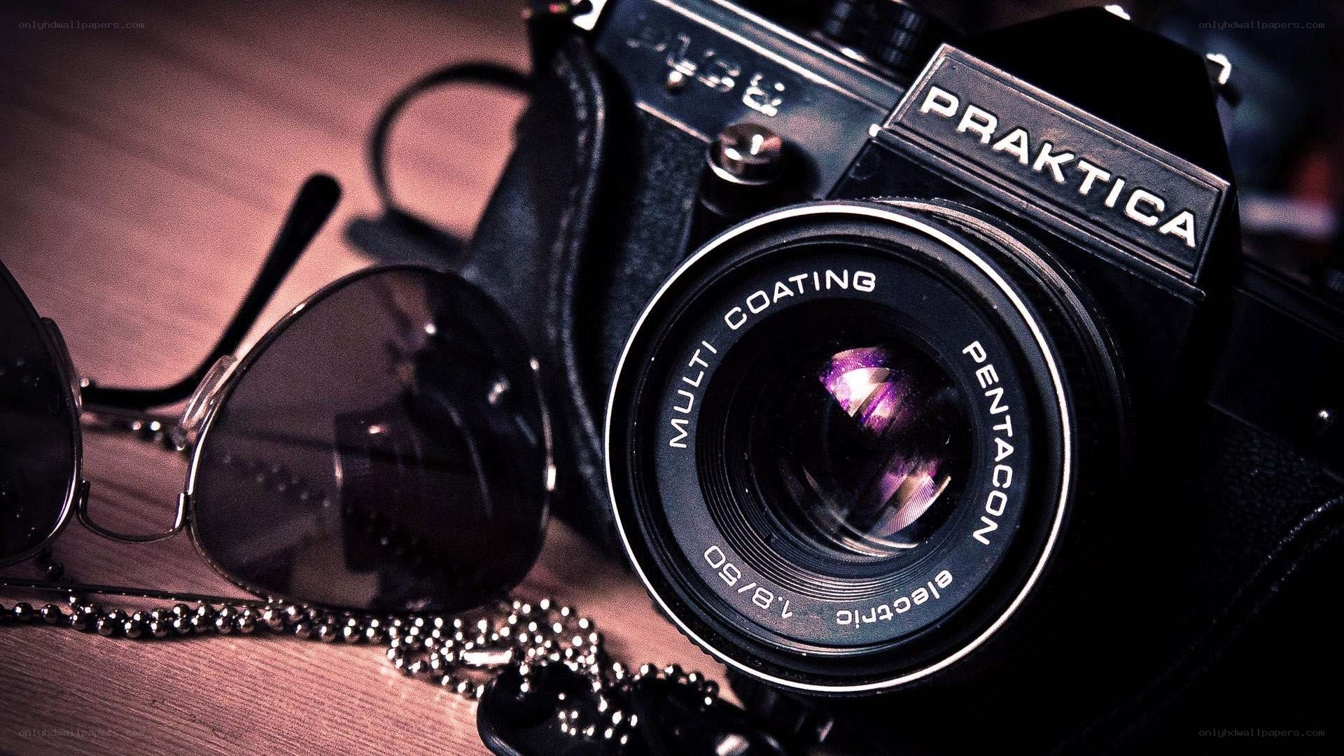 vintage camera and sunglasses