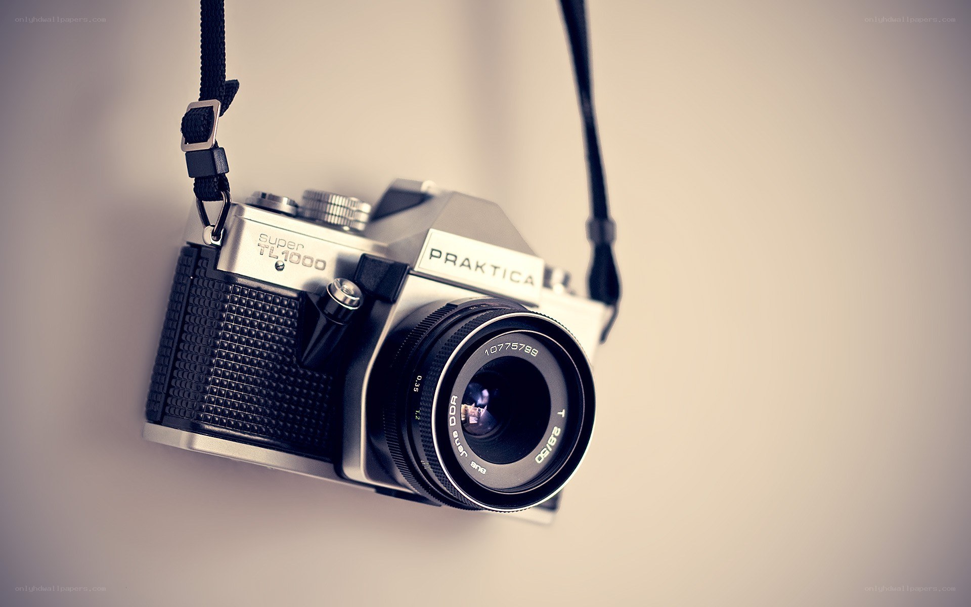 vintage camera hanging on strap