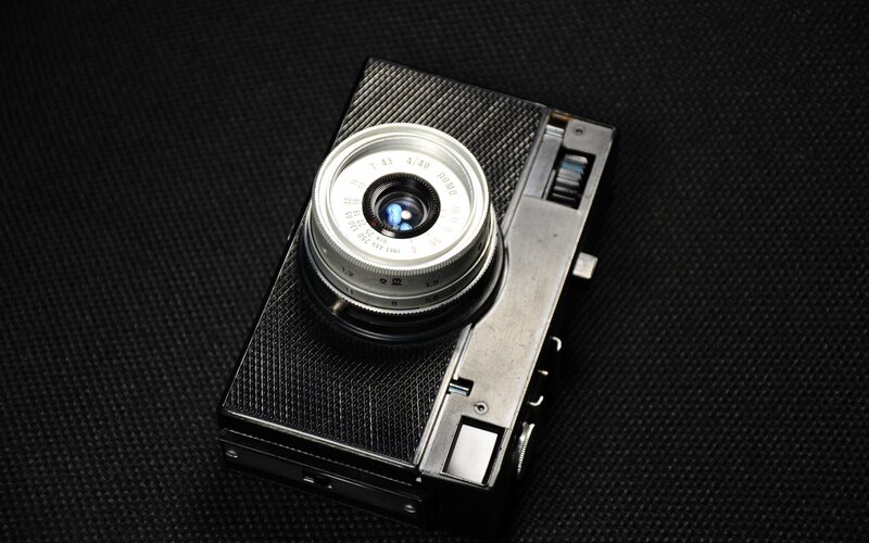 Vintage Camera on Black Surface