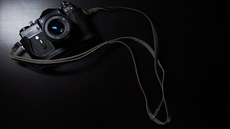 vintage camera on dark surface