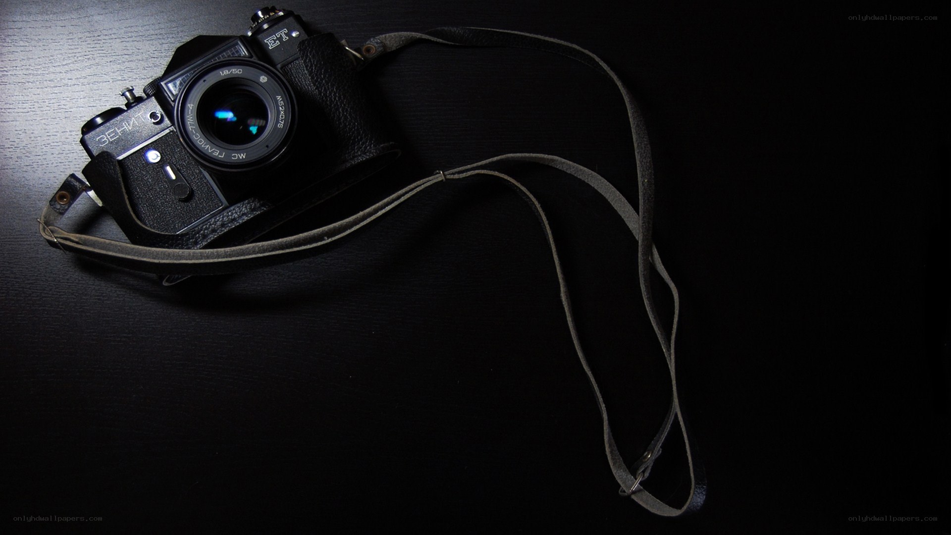 vintage camera on dark surface