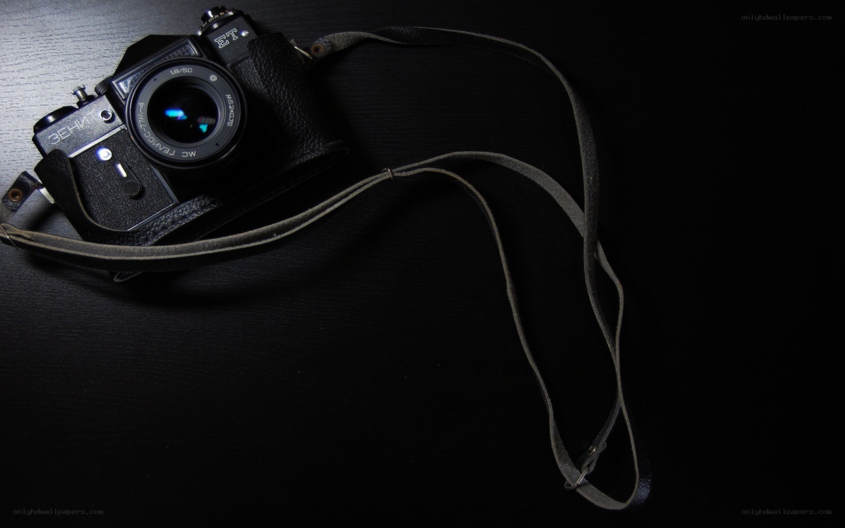 vintage camera on dark surface
