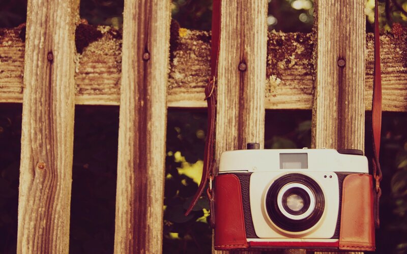 Vintage Camera on Fence