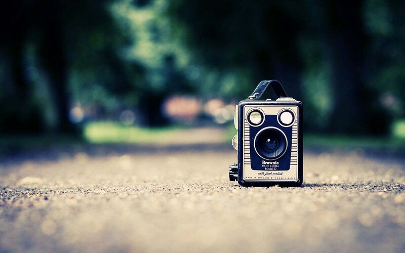 Vintage camera on pavement