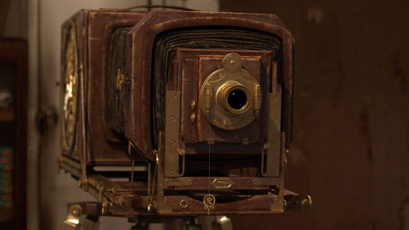 vintage camera on tripod
