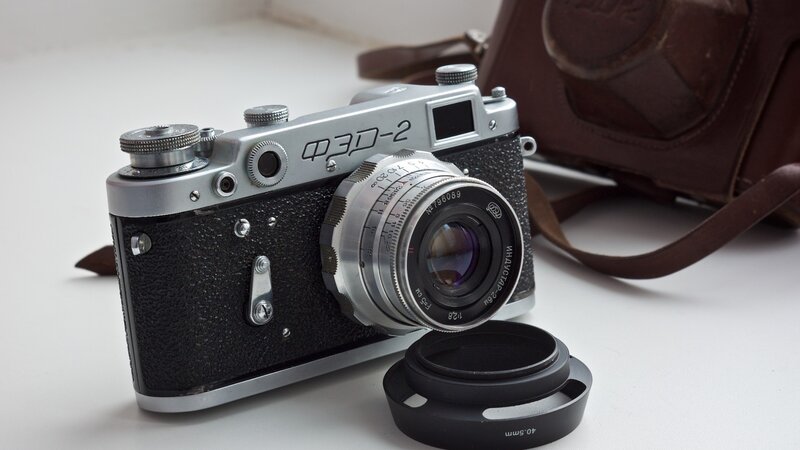 Vintage Camera on White Surface — Neutral