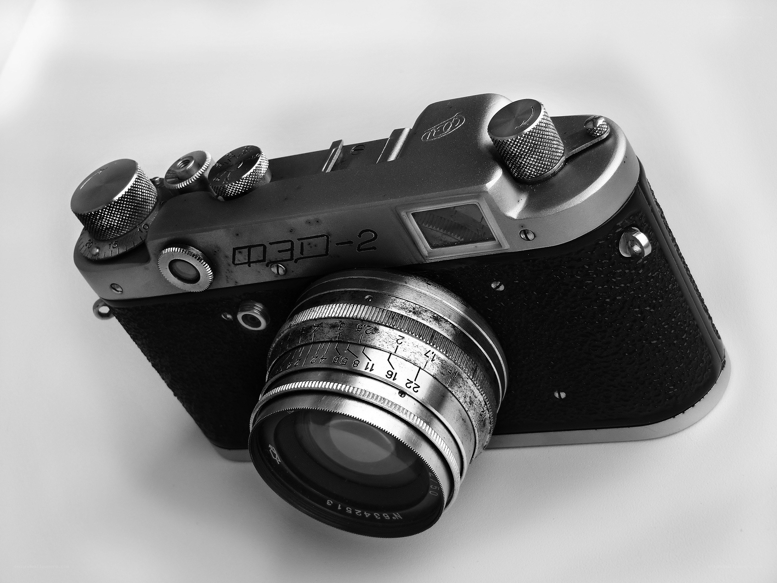 vintage camera on white surface