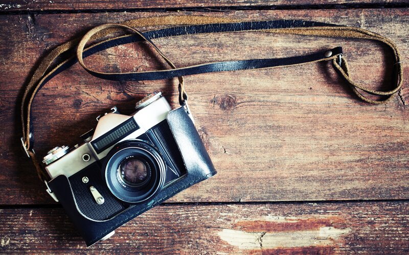 Vintage Camera on Wood — Brown