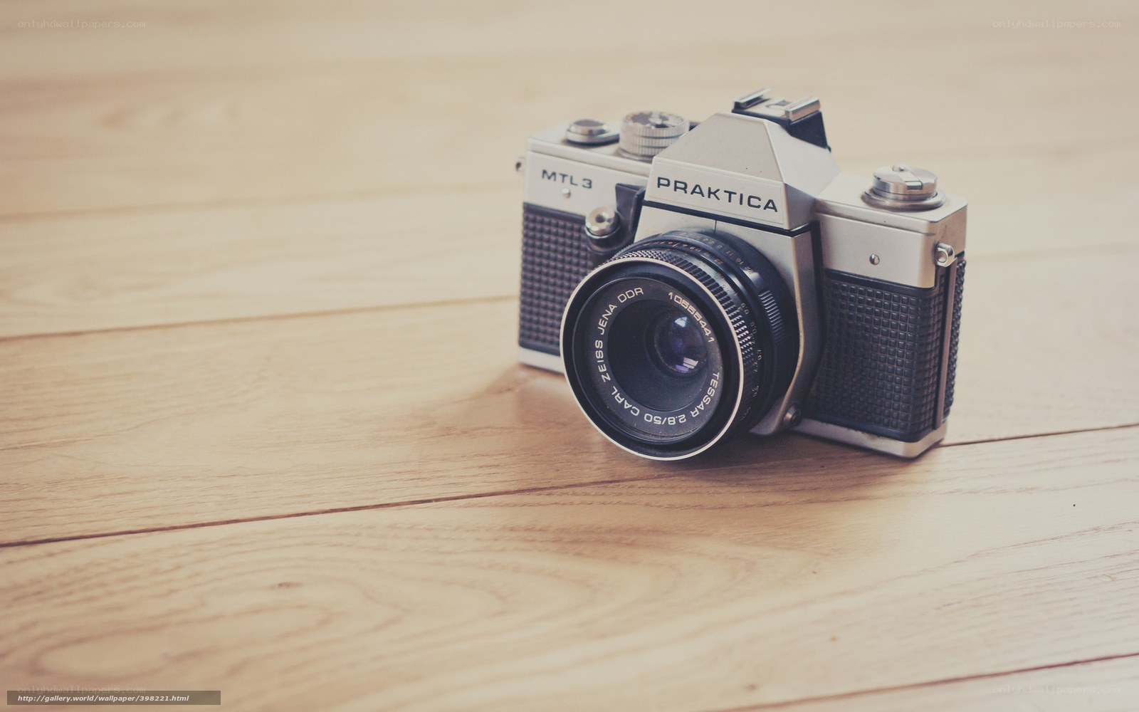 vintage camera on wooden floor