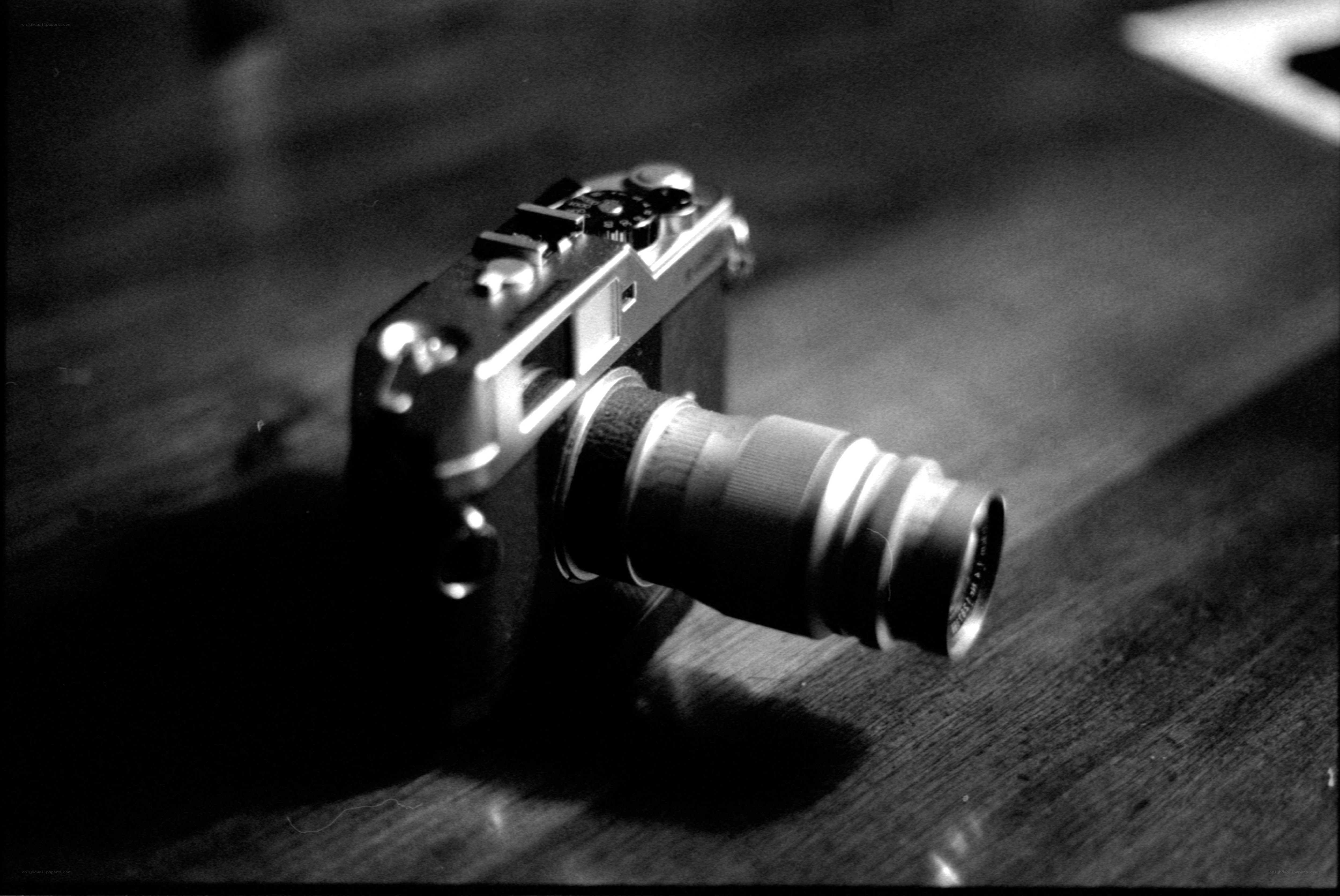 vintage camera on wooden surface
