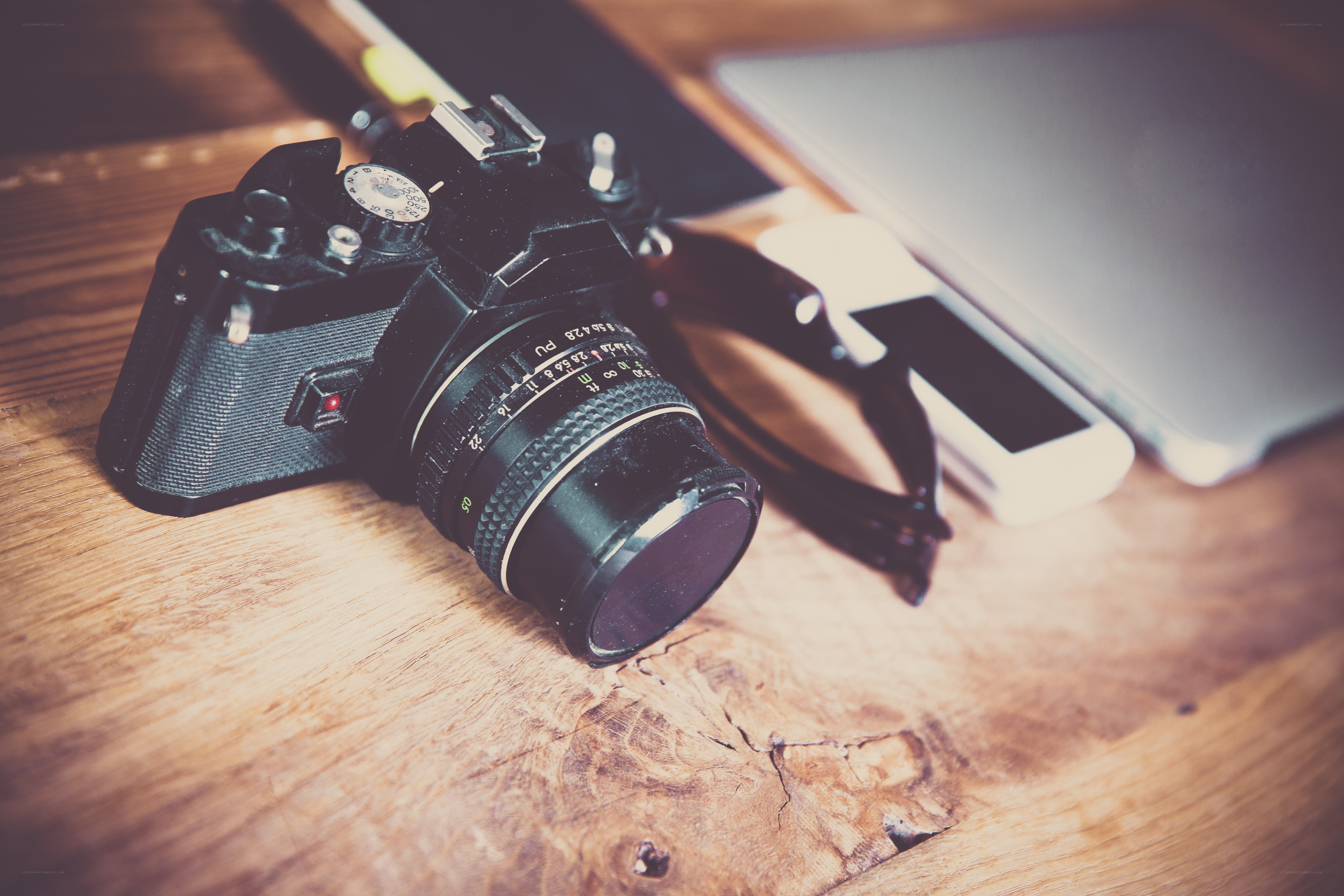 vintage camera on wooden table