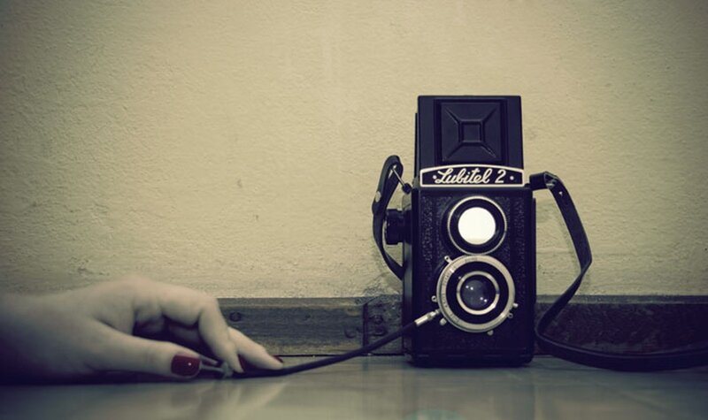 vintage camera with hand